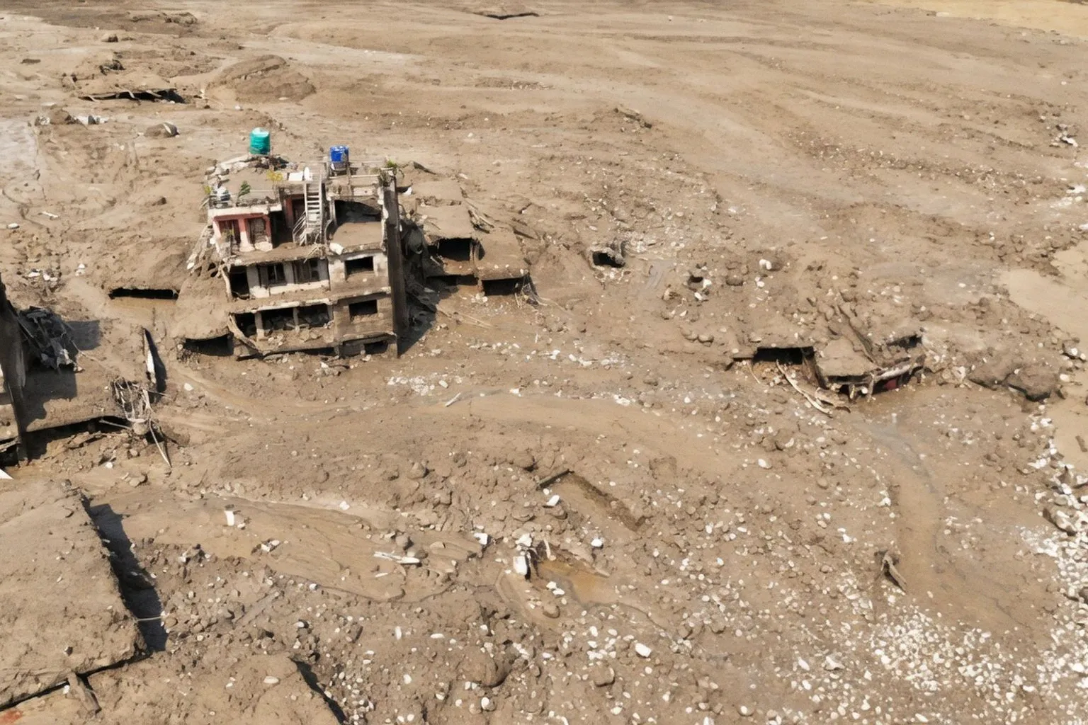 Deadly floods cause widespread destruction in China, Nepal